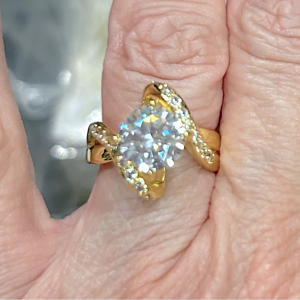 Crystal ring set in fine gold plate-size 7